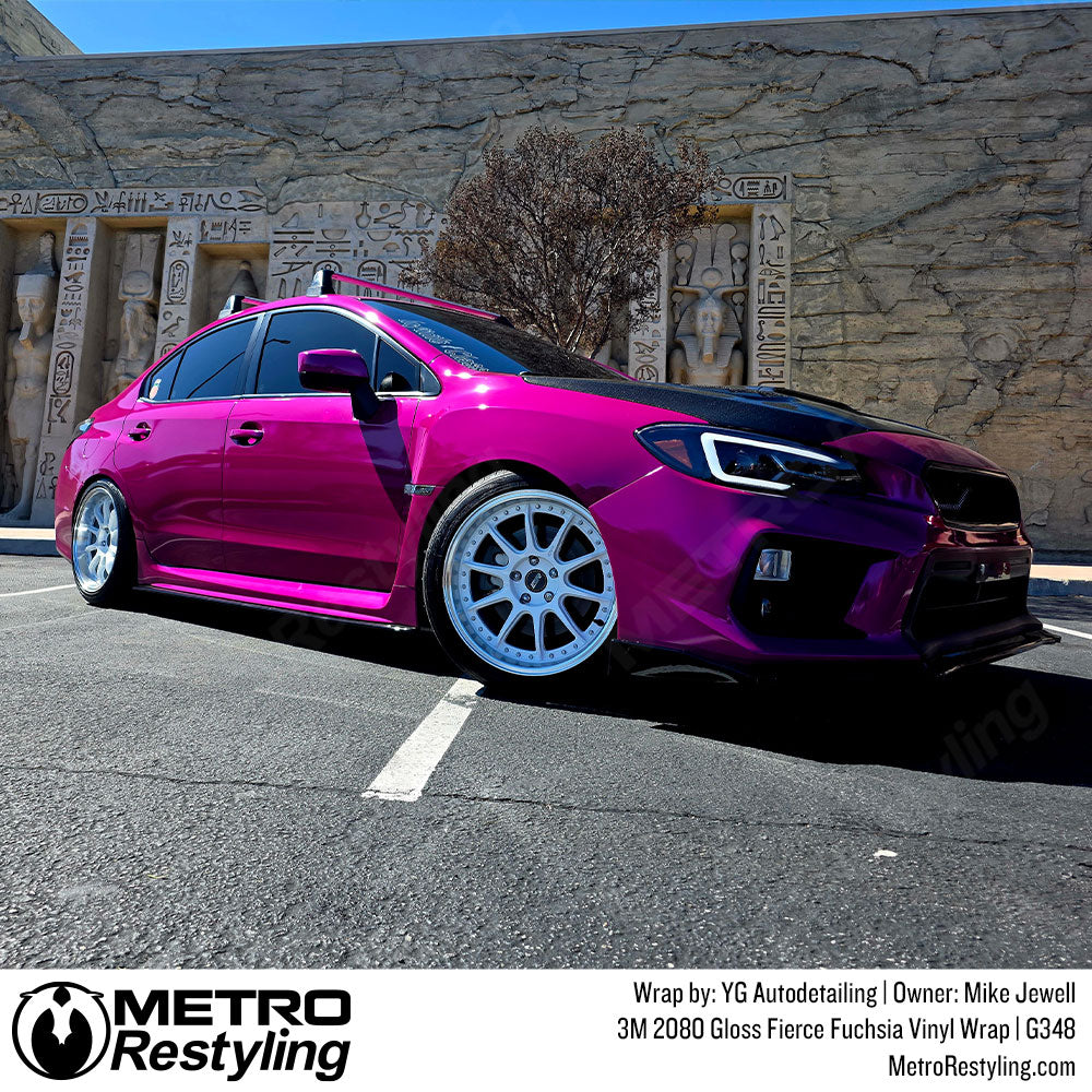 gloss fierce fuchsia vinyl wrap on subaru