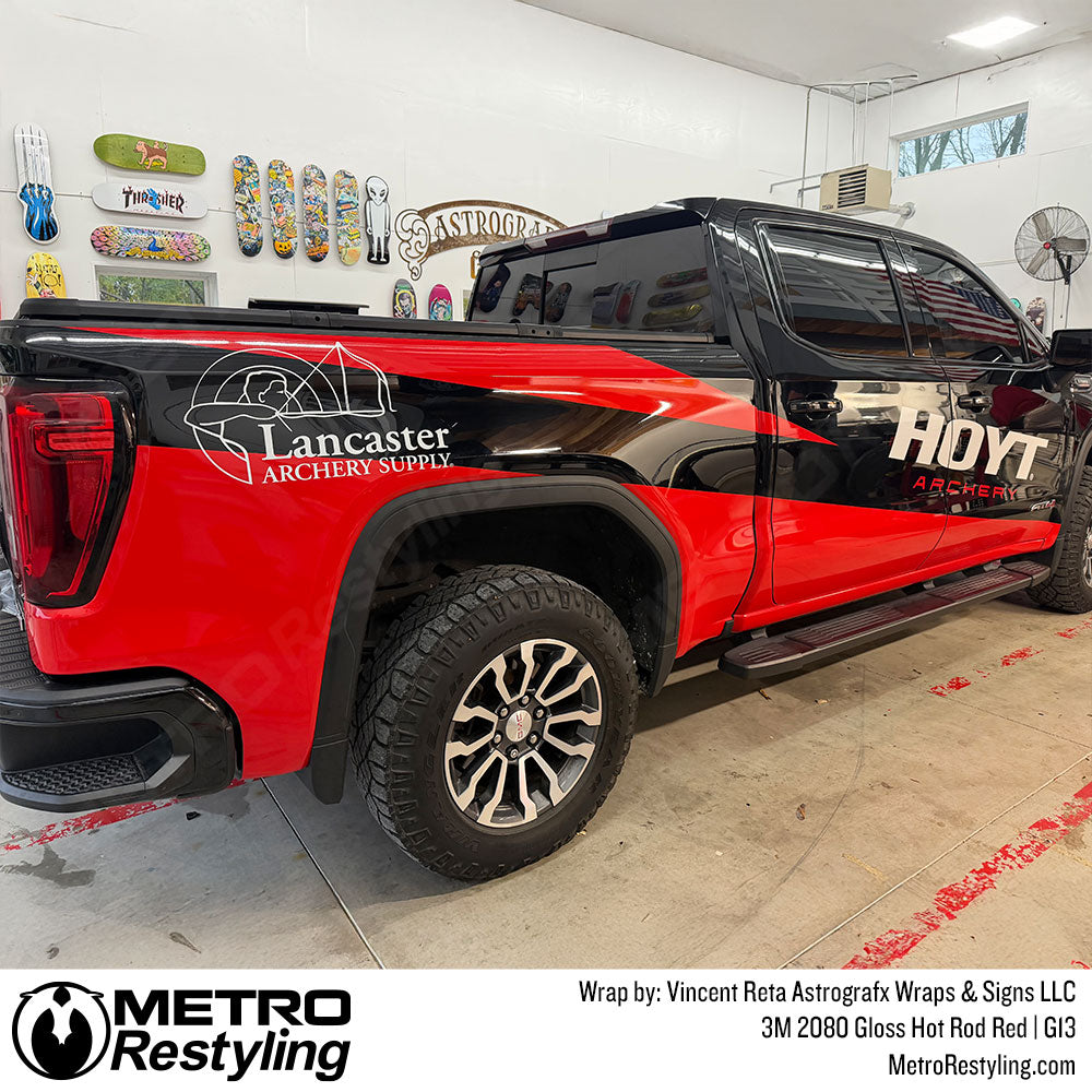 GM truck with red wrap