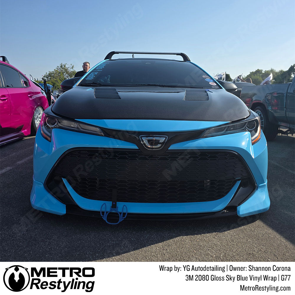 sky blue wrap on hatchback