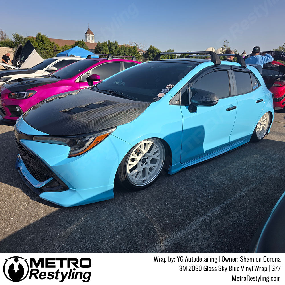 sky blue wrap on hatchback