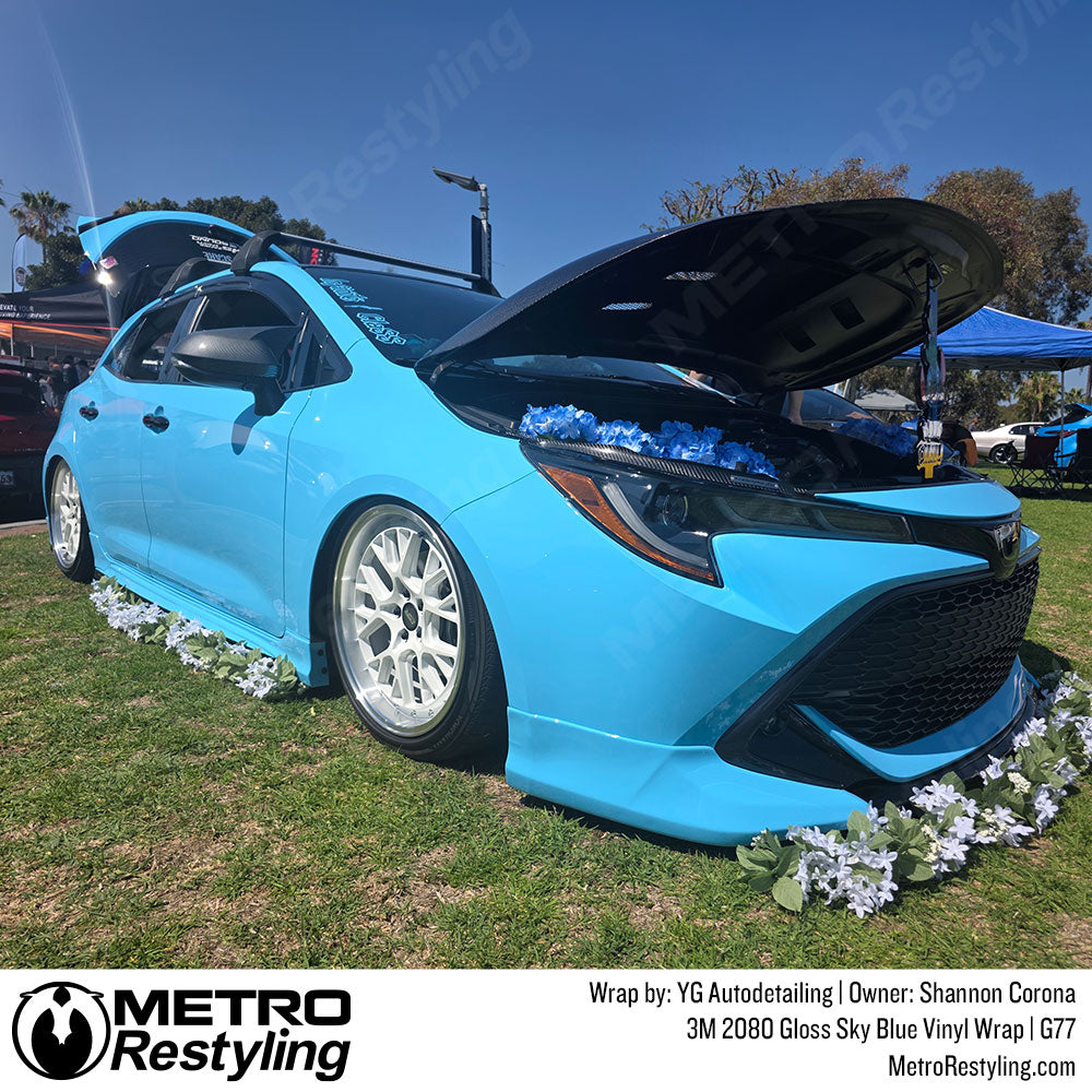 sky blue wrap on hatchback