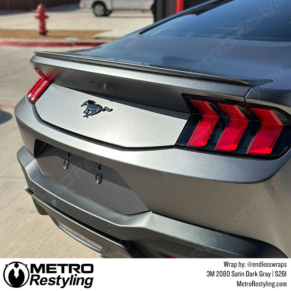 ford mustang with dark grey color change vinyl wrap
