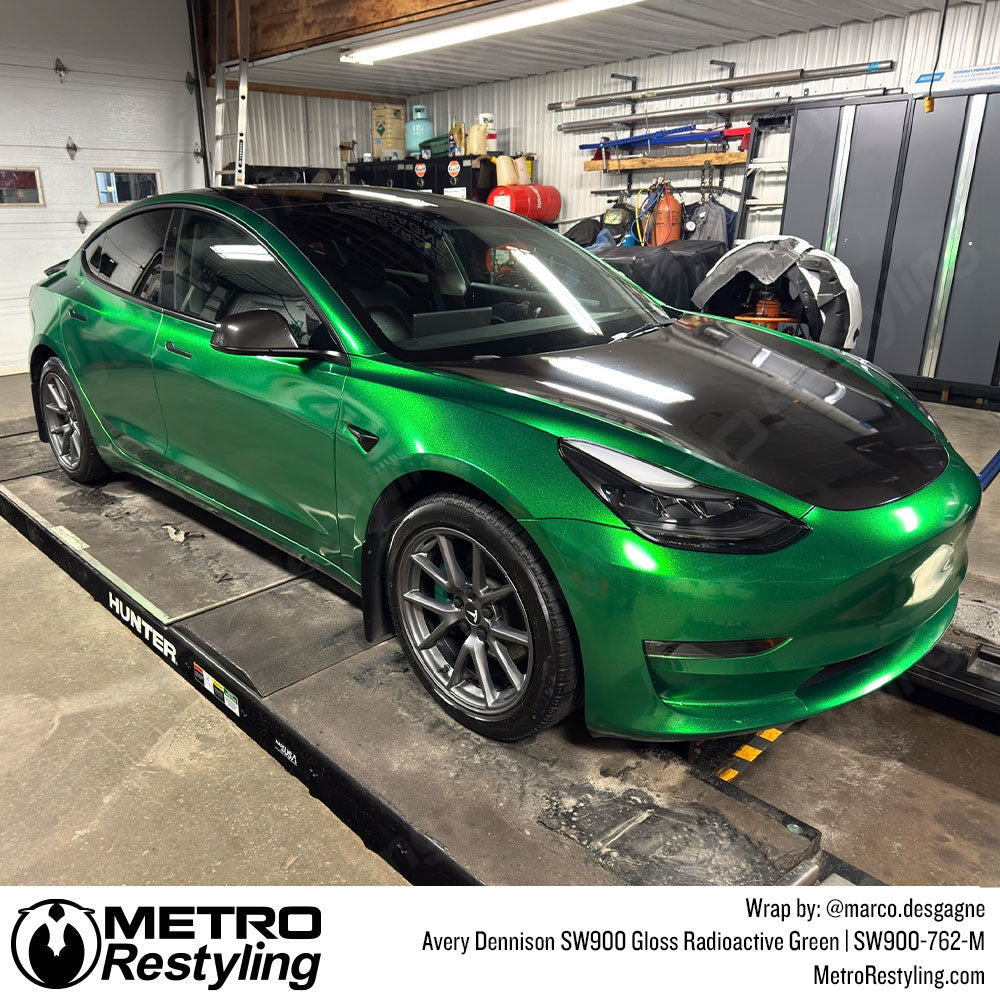 tesla with green wrap