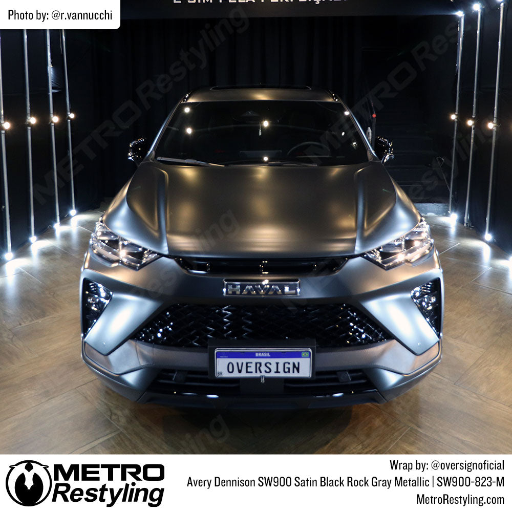 BMW with black vinyl car wrap