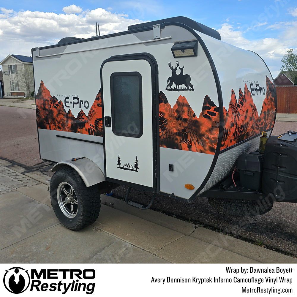 camper wrapped with kryptek inferno camo