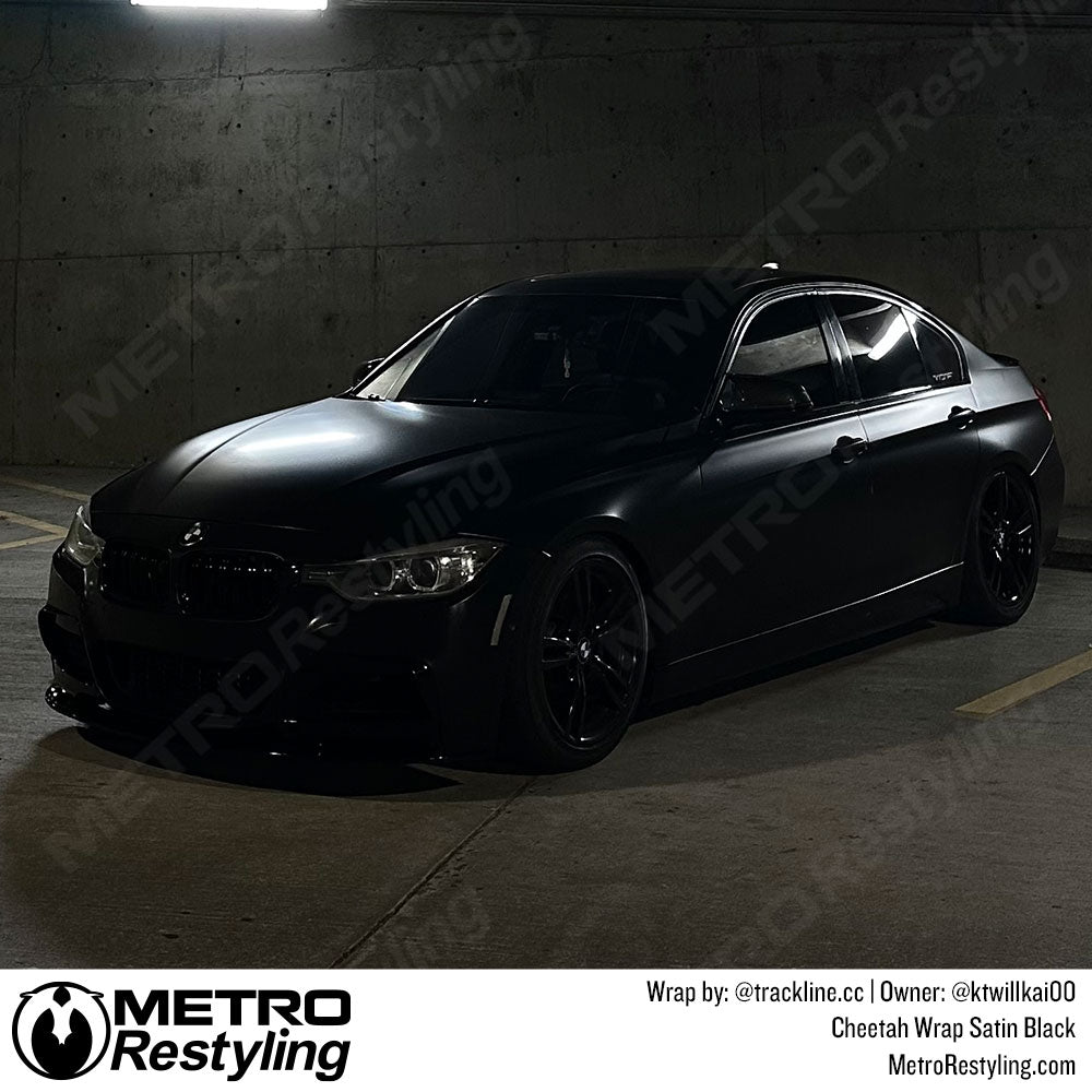 car with black vinyl wrap