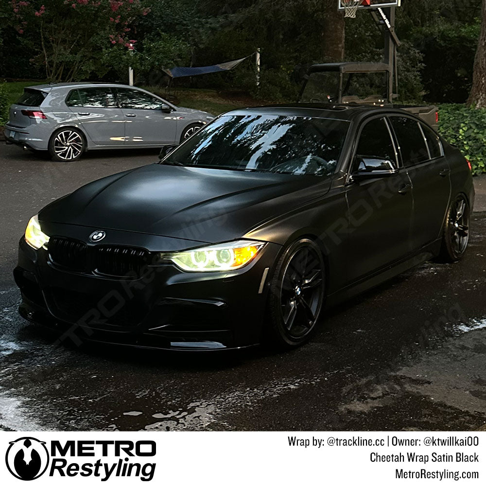 car with black vinyl wrap