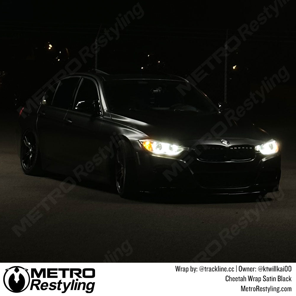 car with black vinyl wrap