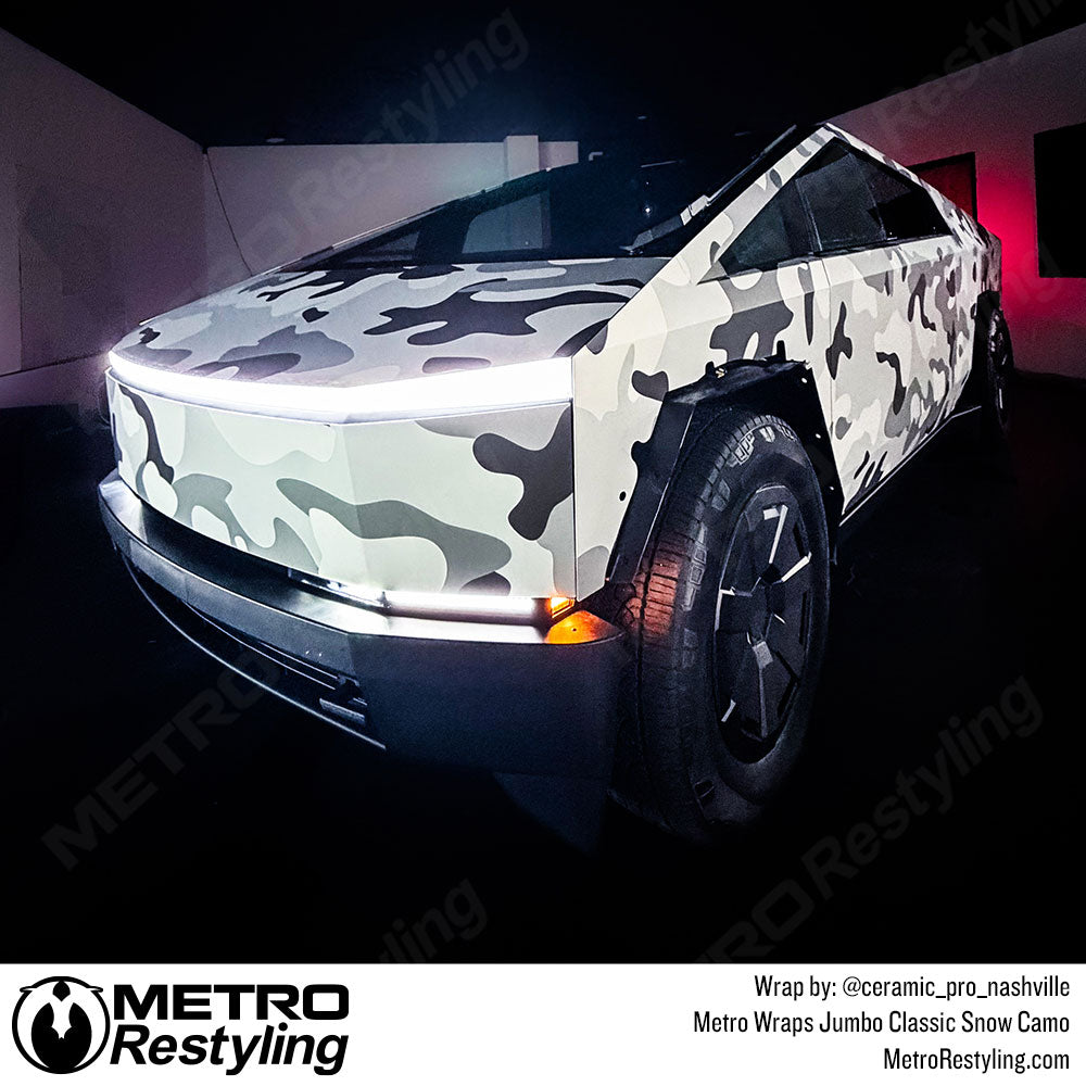 tesla cyber truck with white camo wrap