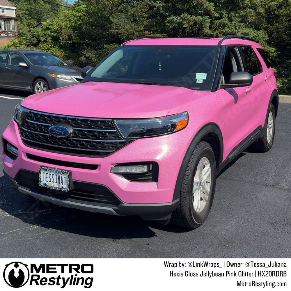 SUV with pink vinyl color change wrap