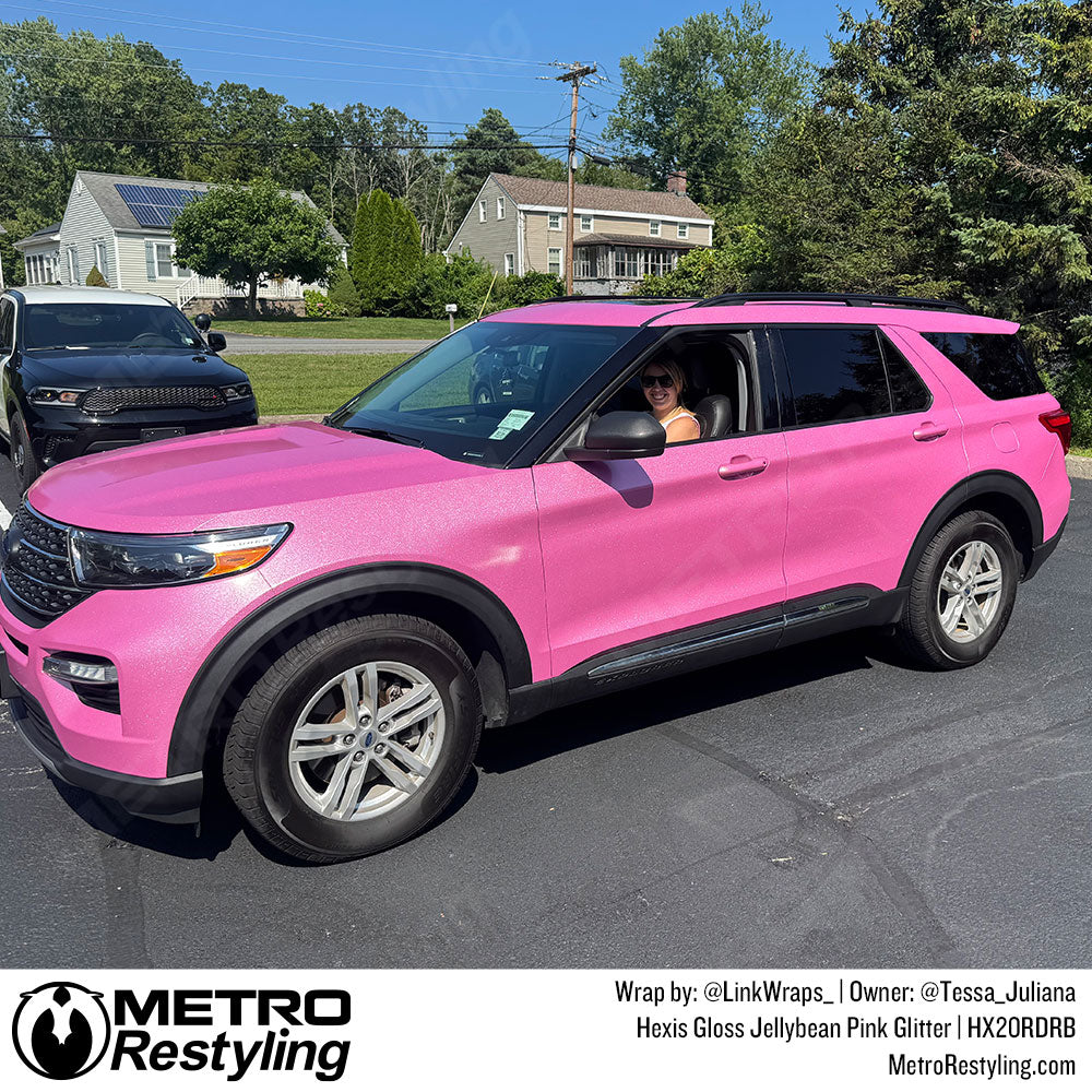 SUV with pink vinyl color change wrap