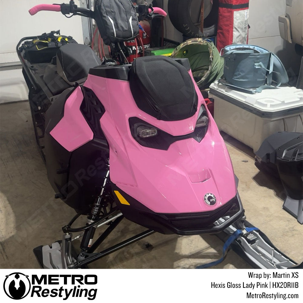 snowmobile with pink vinyl wrap