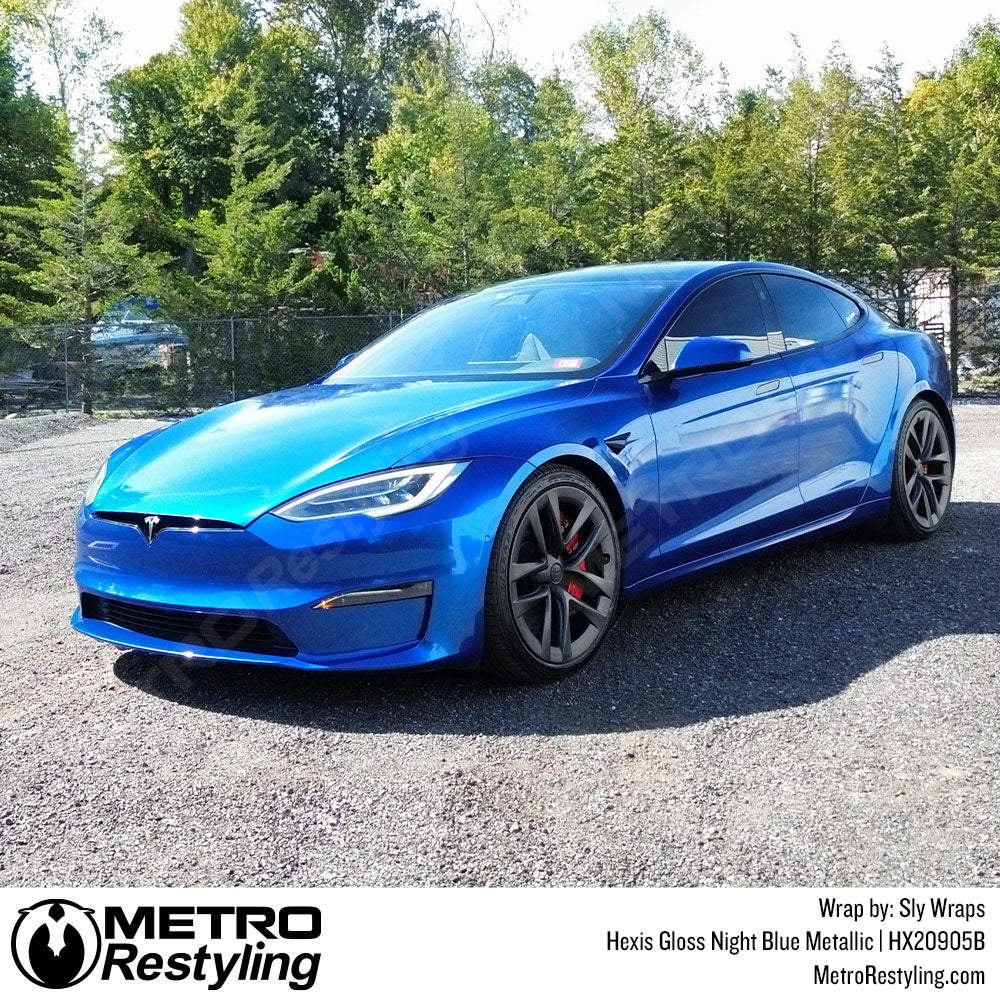 tesla with metallic blue wrap