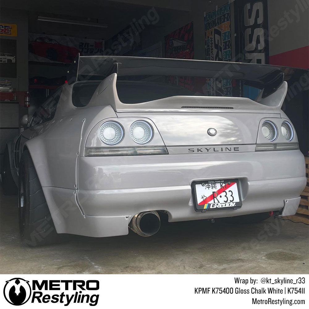 nissan car with white wrap