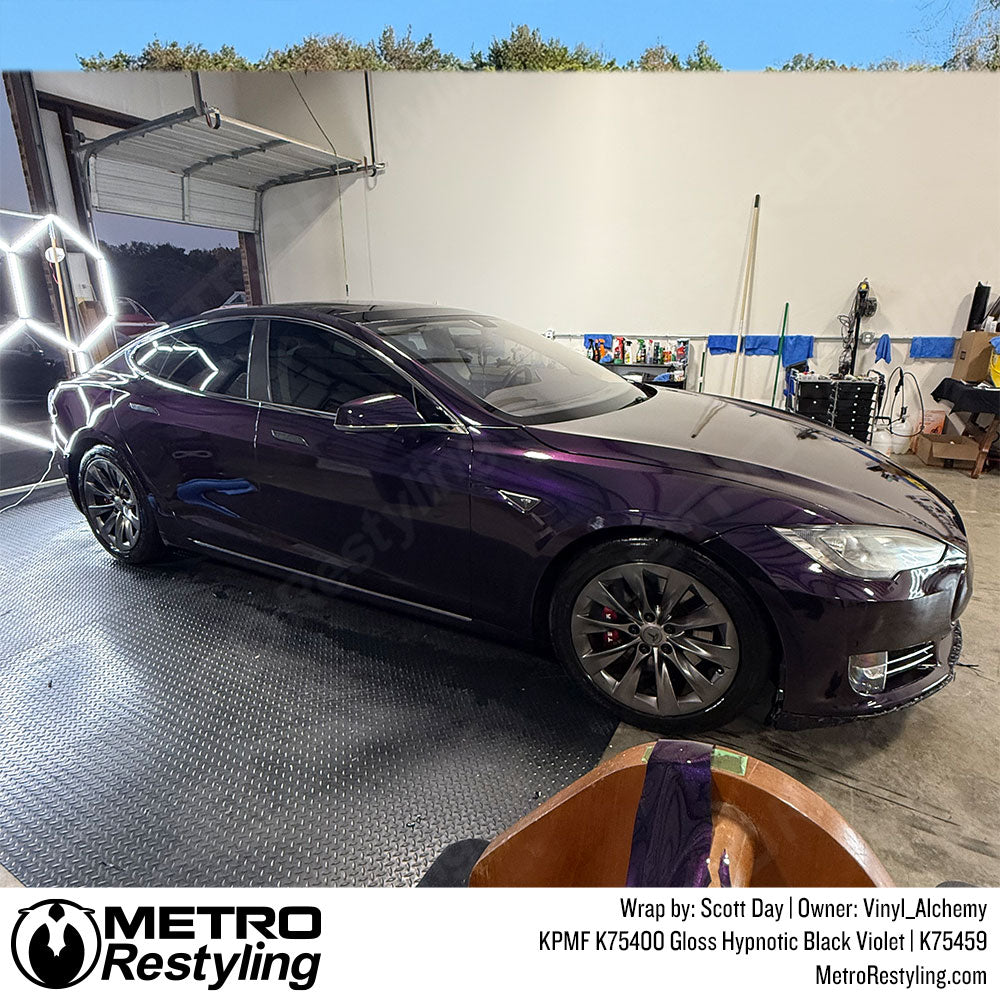 tesla with purple wrap