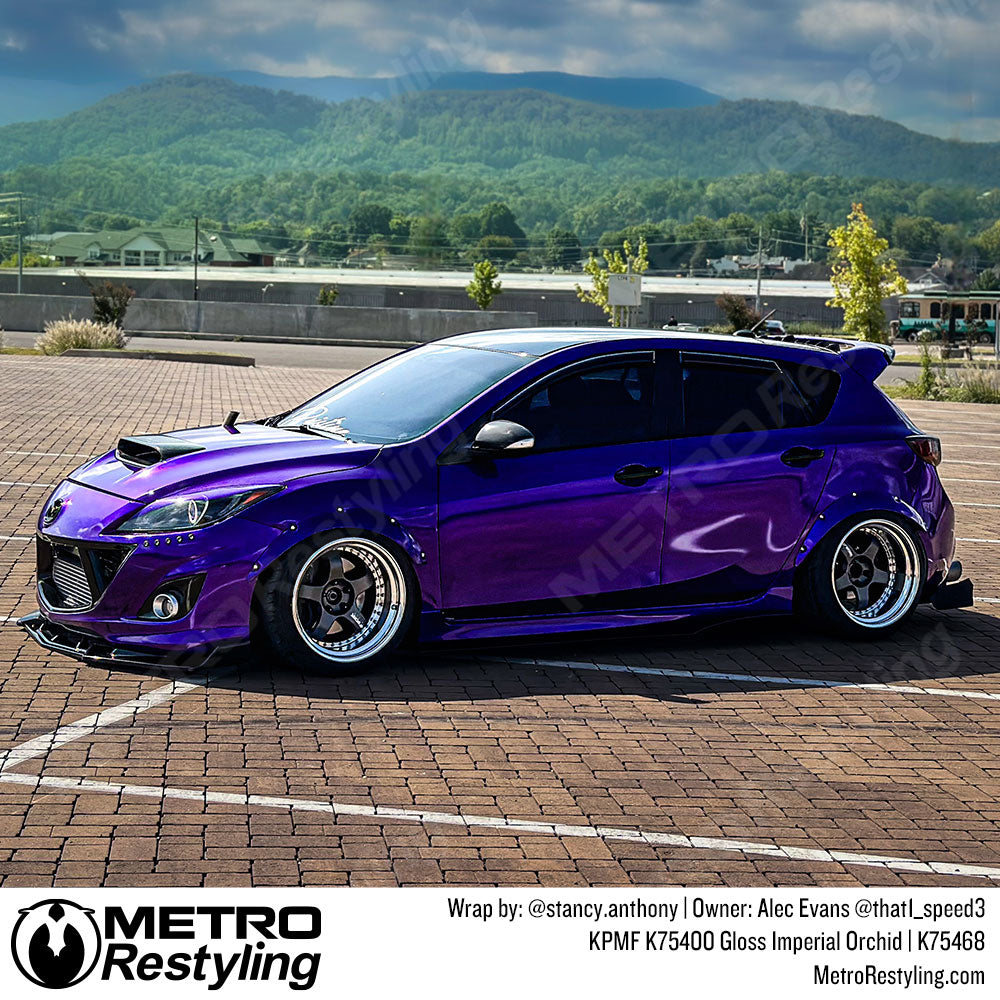 mazda with purple wrap