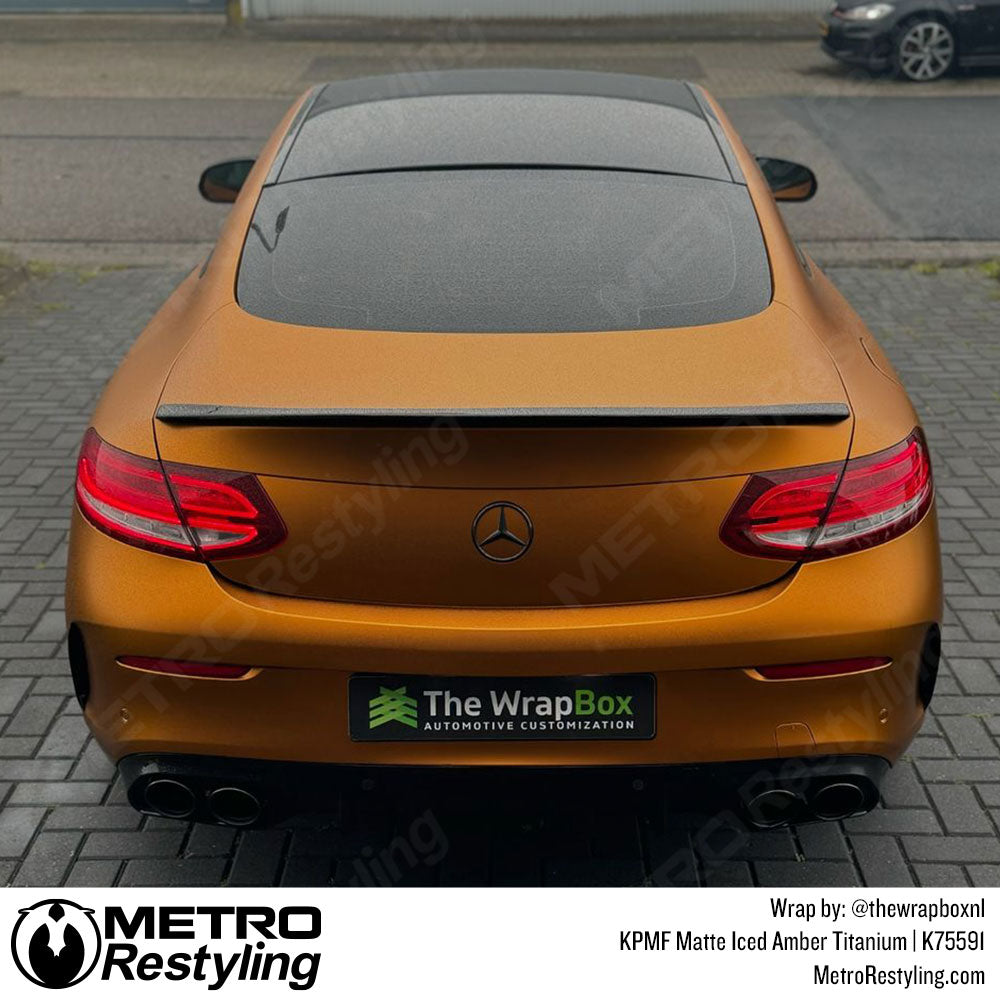 Mercedes with orange vinyl wrap