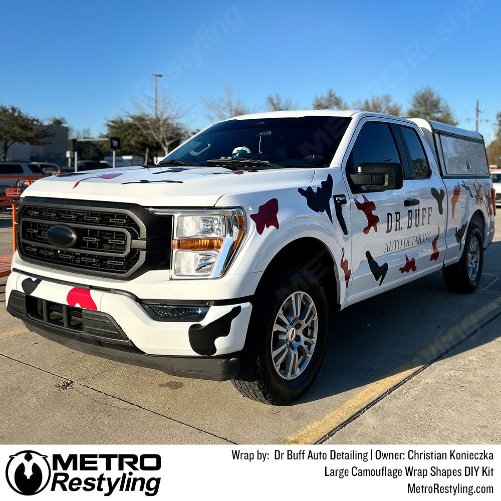 truck with custom camo vinyl wrap