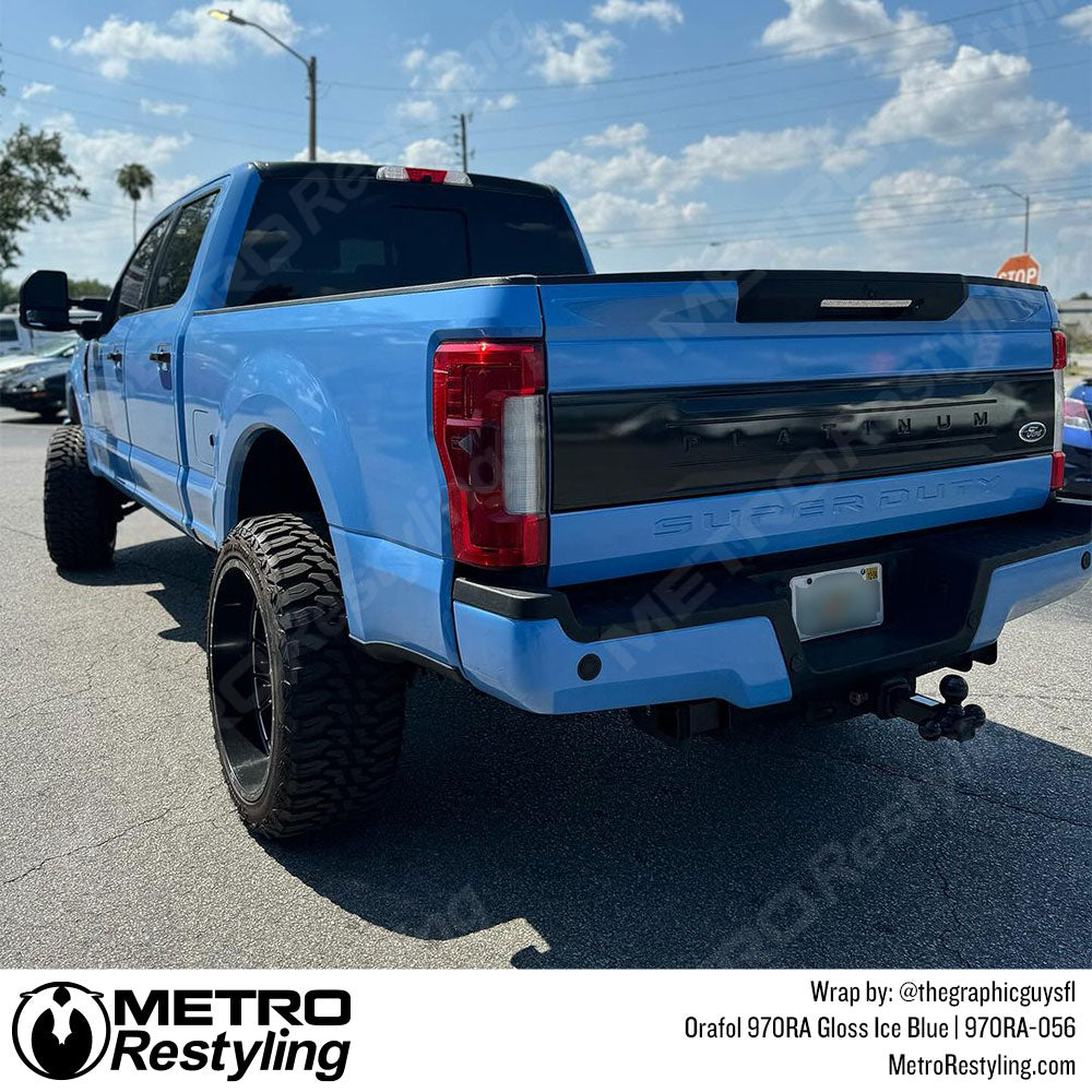 light blue truck wrap