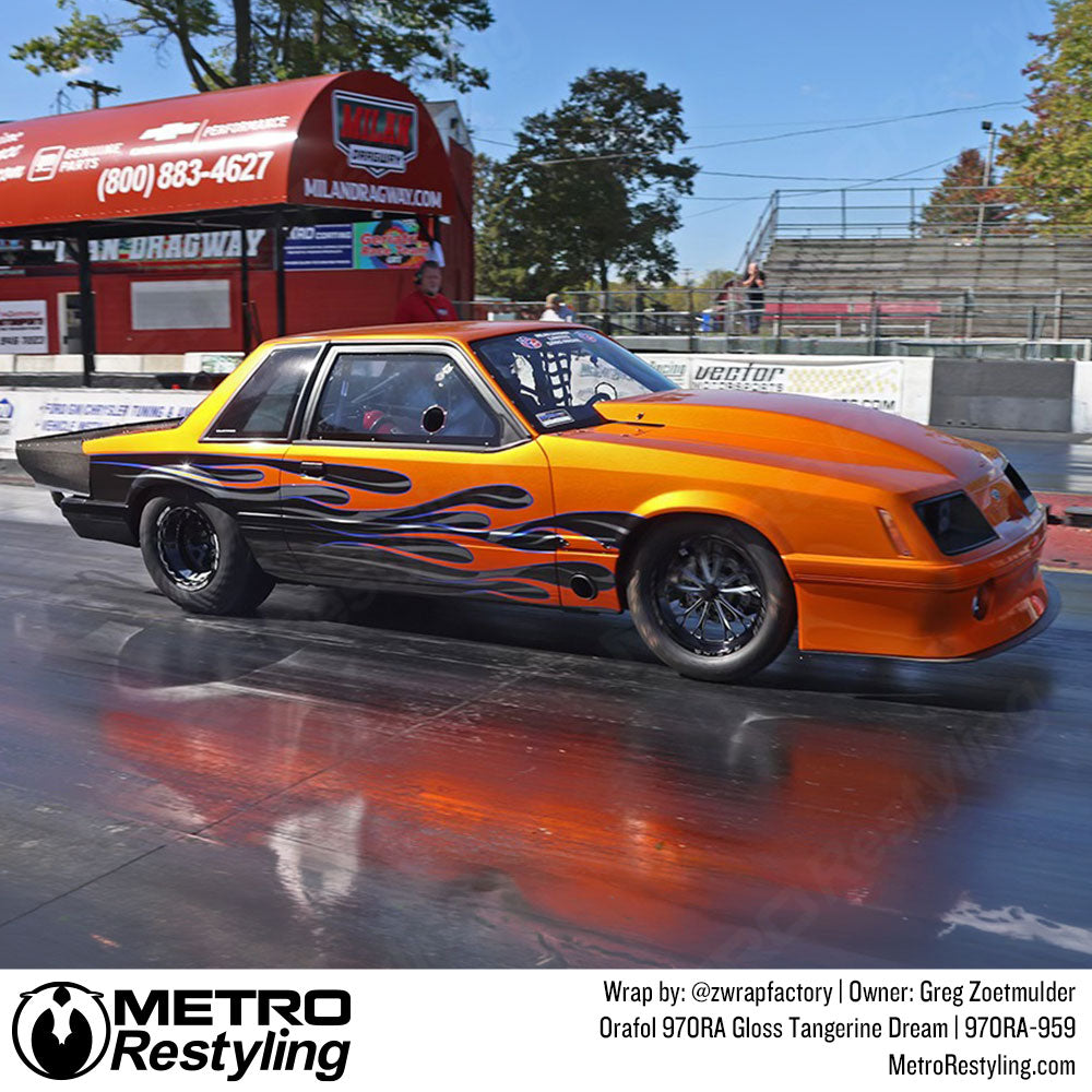 ford mustang with orange wrap