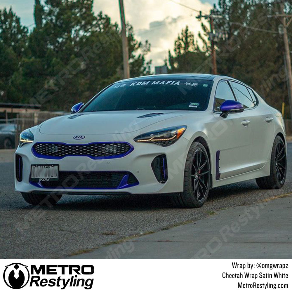 white kia stinger wrap